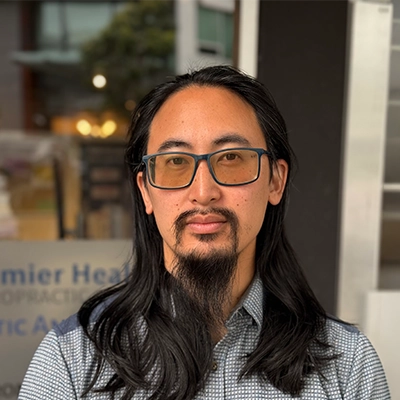 Massage Therapist David Liao Smiling Outside The Clinic