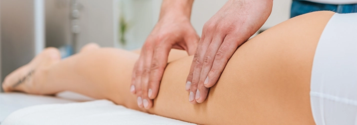 Deep Tissue Massage On A Patient's Leg
