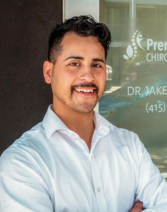 Chiropractor Jake Castrejon Smiling Outside The Clinic