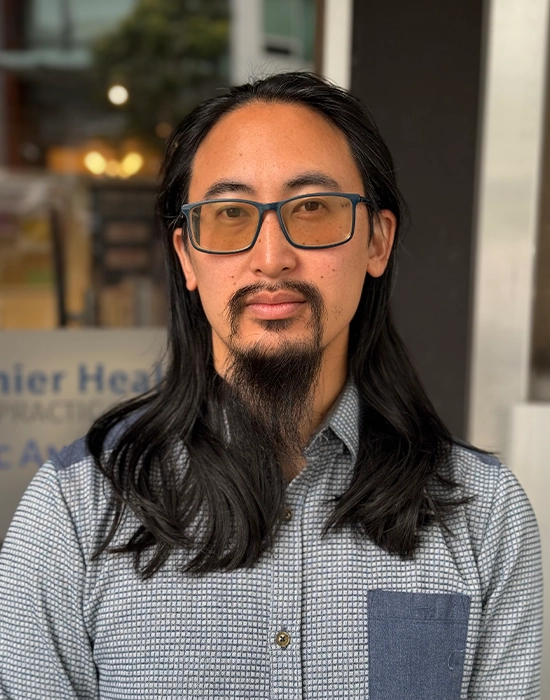 Massage Therapist David Liao Smiling Outside The Clinic